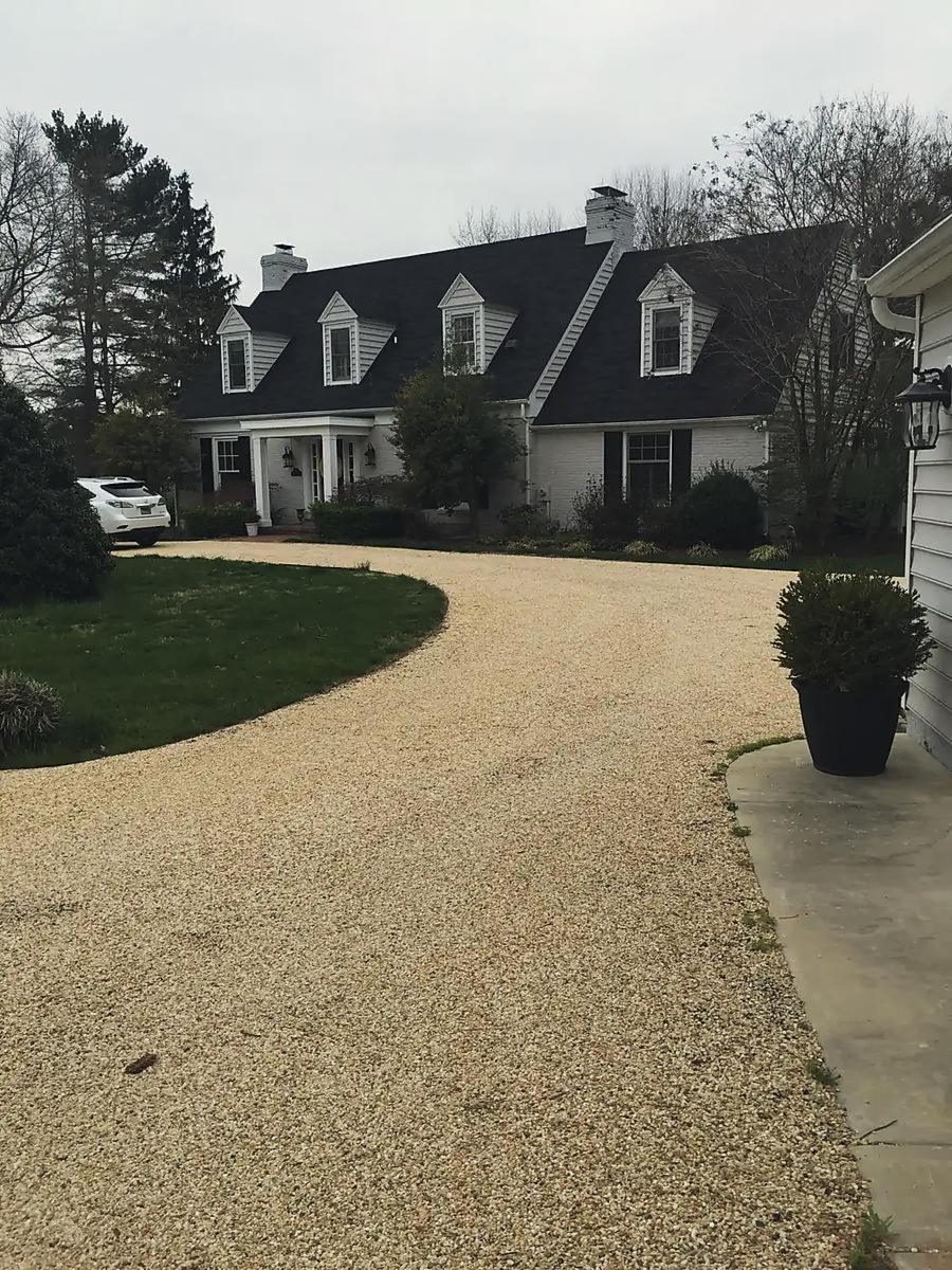 Tan chip, curving to the garage