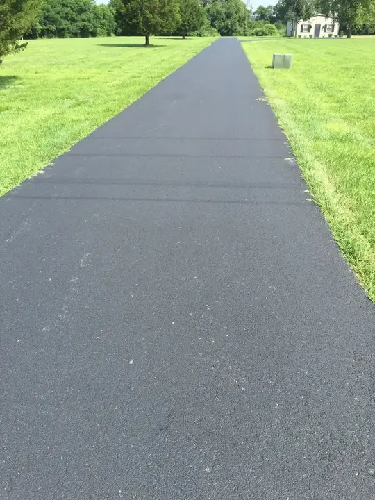 Driveway Paving Long Approach To White Farmhouse Federalsburg Md