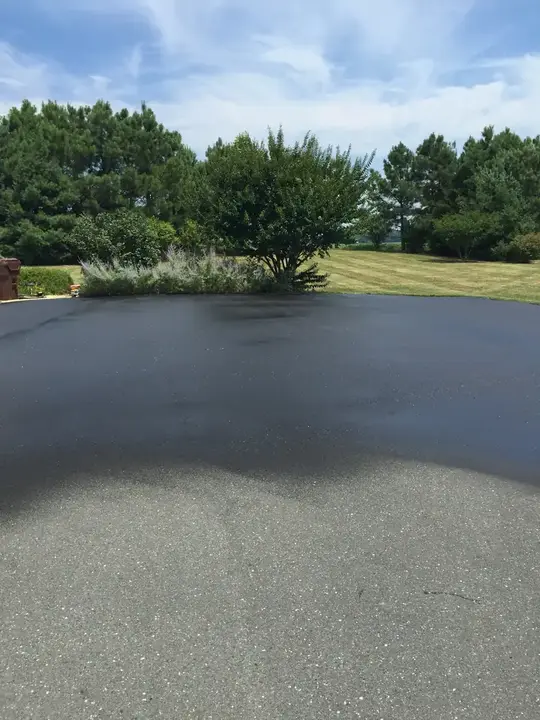 Sealcoating Fresh Sealer Wet Across The Driveway Federalsburg Md